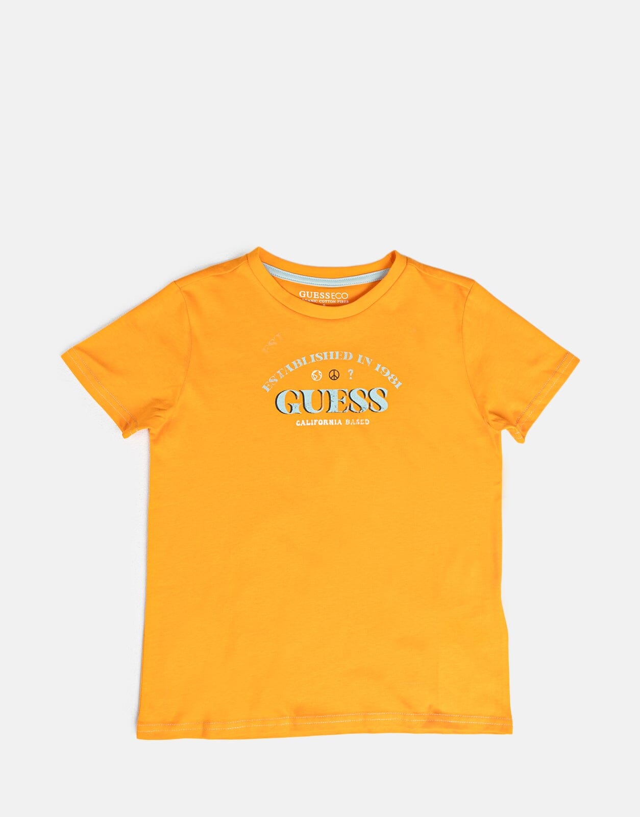 yellow and white guess shirt